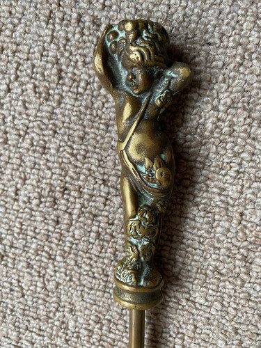 Old brass cherub fire poker - old,